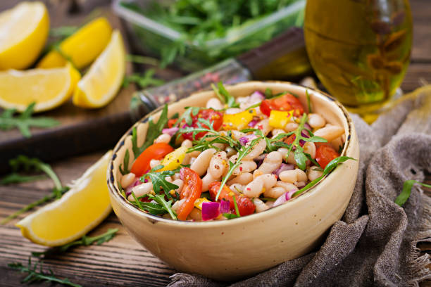 istock White bean cannellini salad. Vegan salad. Diet menu 920387510