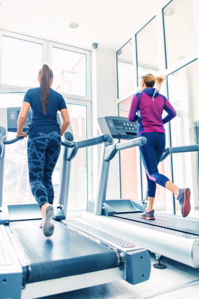 istock Women running on treadmill 920392378