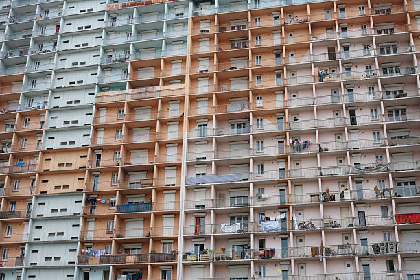The serried ranks of windows in large apartment blocks in UK