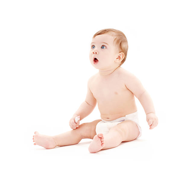 istock baby boy in diaper with toothbrush 92039554