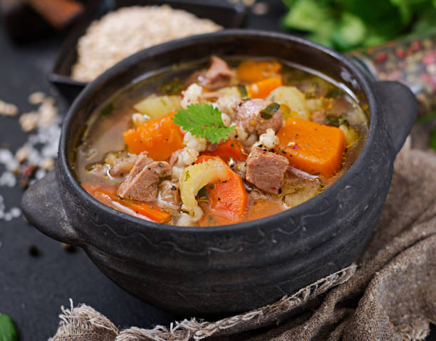 istock Thick soup with beef, pearl barley, pumpkin and celery. Dietary menu. 920395896