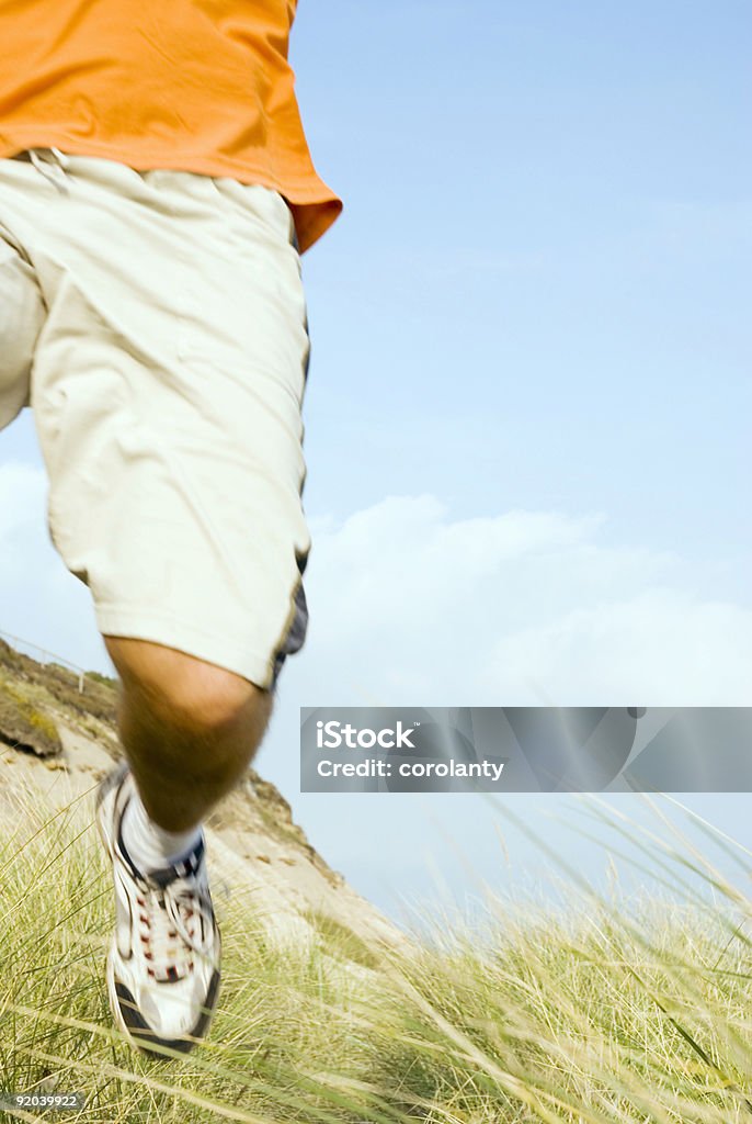 Homem correndo na praia - Foto de stock de Agilidade royalty-free