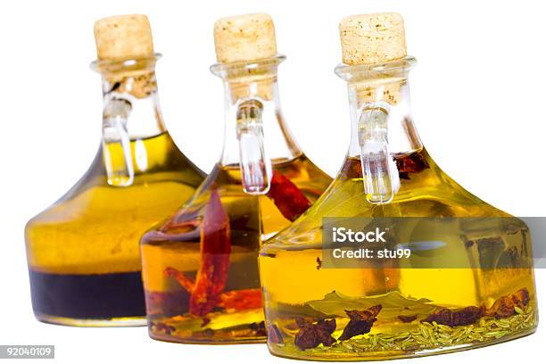 Condimento De Aceites Foto de stock y más banco de imágenes de Aceite de infusión - Aceite de infusión, Botella, Fondo blanco