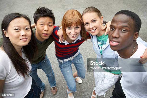 The Five Pack Multicultural Friends Stock Photo - Download Image Now - Agreement, Arm In Arm, Carefree