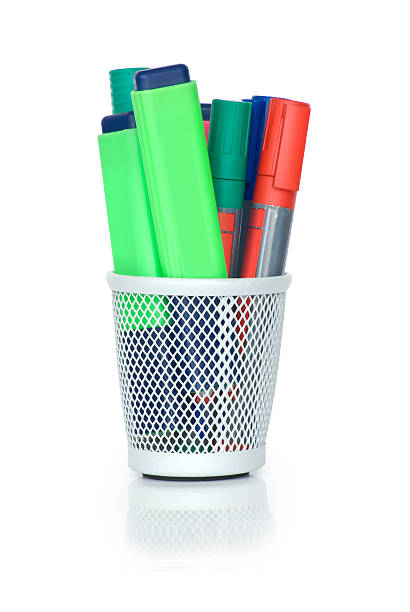 Bunch of markers jumbled up in a nice canister. stock photo