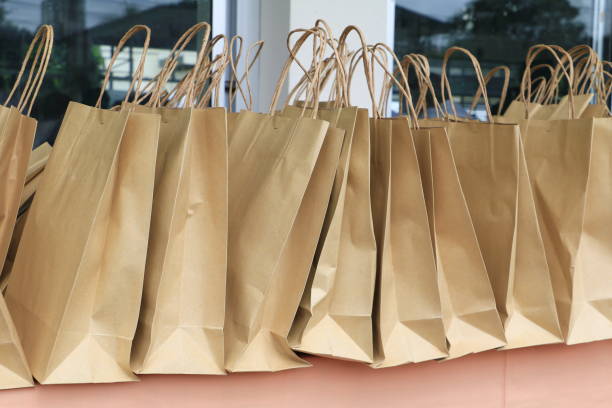 istock close up paper bag of kraft  brown  on  table 920406046