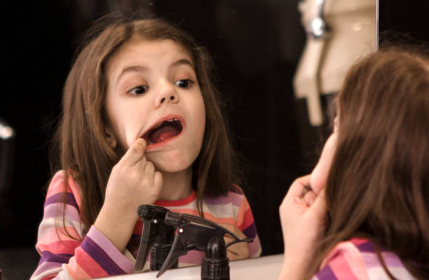 Little girl looking for a tooth