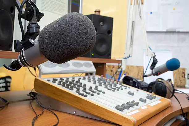 Photo of Close up of a microphone at a radio station