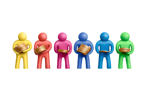 Multicolored plasticine human figures with a stacks of coins