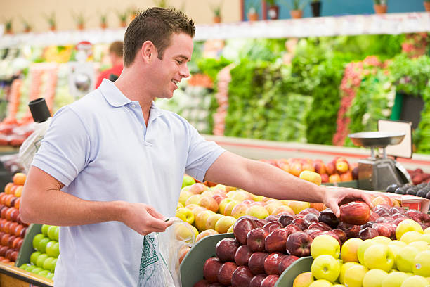 istock Man shopping in produce section 92041915