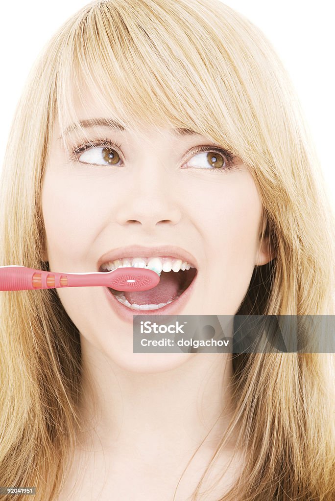 Glückliche Mädchen mit Zahnbürste - Lizenzfrei Attraktive Frau Stock-Foto