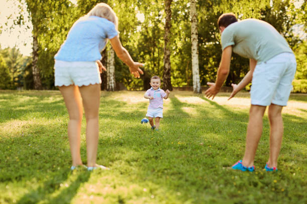 istock Happy family in nature 920421884