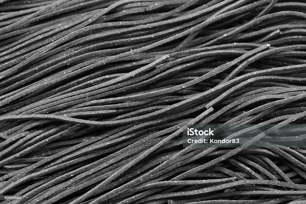 Black pasta  Backgrounds Stock Photo