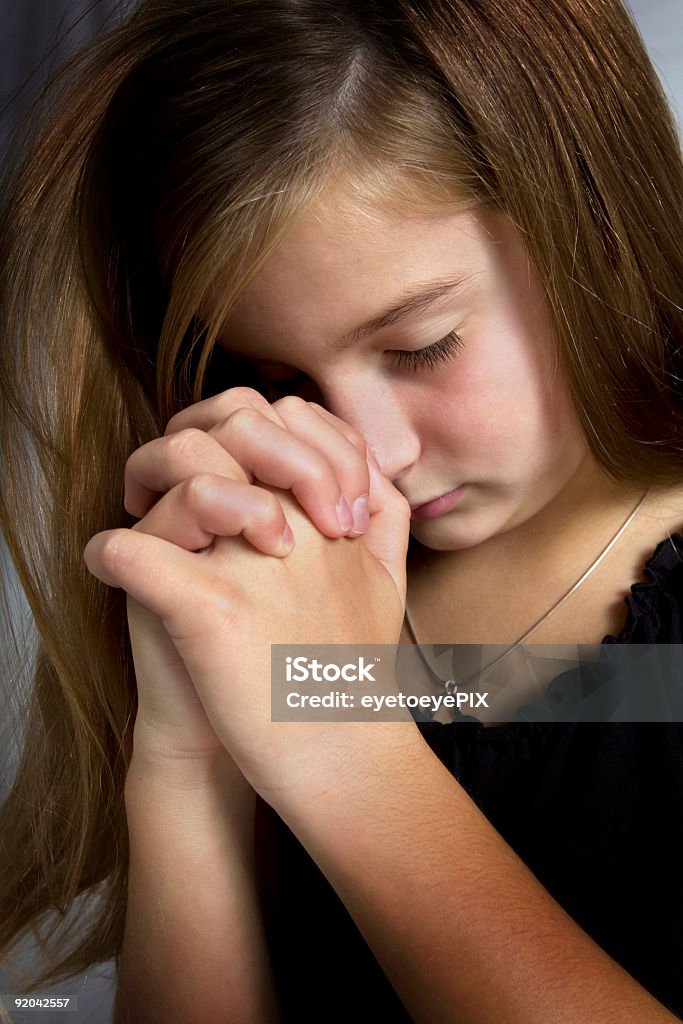 Cute girl in prayer to Jesus  Child Stock Photo