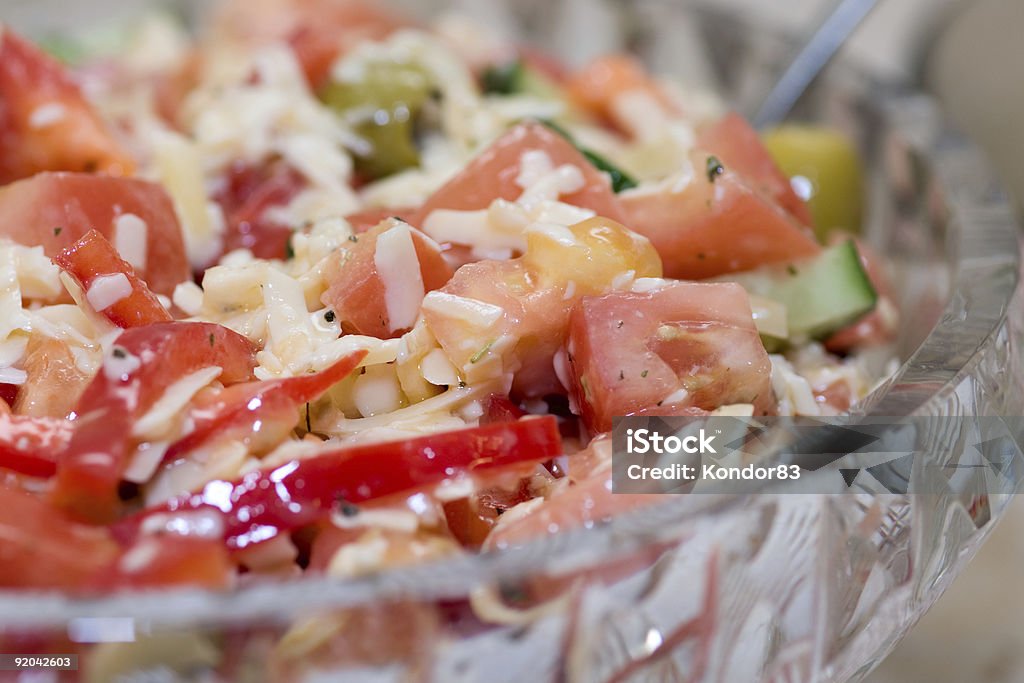 Mediterranean salad in glass plate, selective focus  Backgrounds Stock Photo