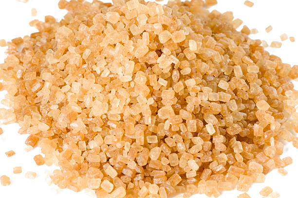 istock Heap of brown cane sugar, macro lens shot 92042628