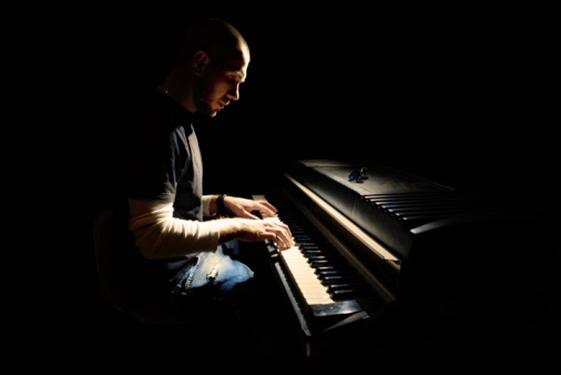 Pianist playing on electric piano