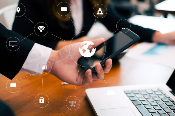 istock businessman analyze financial chart in smartphone . business team working with startup project. man & woman discussing market plan report at workplace. discussion, teamwork with internet of thing icon 920428082