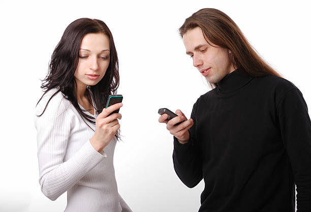 istock Young couple texting by phone 92042885
