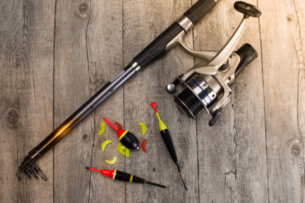 istock fishing tackle on a wooden table 920434062