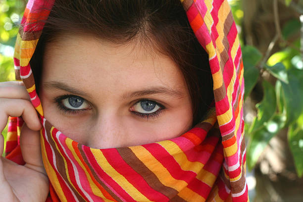 Young girl with blue eyes stock photo