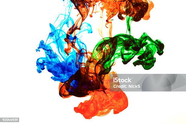 Blue Red And Green Ink Dispersing In Water Stock Photo - Download Image Now - Mixing, Color Image, Colors