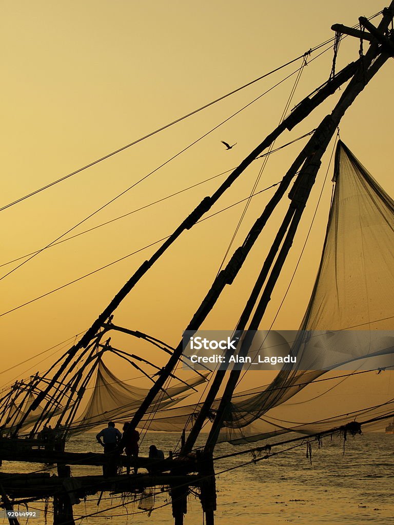 Cochin NET de pesca china, India. - Foto de stock de Anochecer libre de derechos