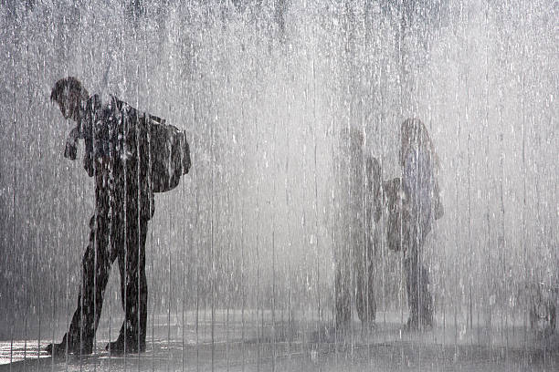 istock People in water fountain 92045386