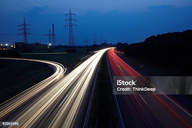 Nightride Foto de stock y más banco de imágenes de Rastros de luz - Rastros de luz, Vía, Torre de conducción eléctrica