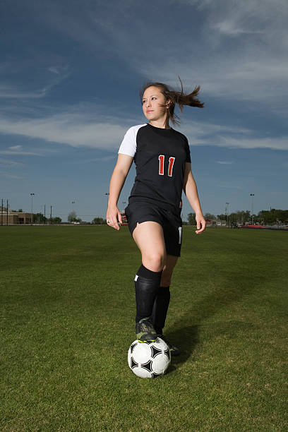 istock Female athlete playing soccer 92045751