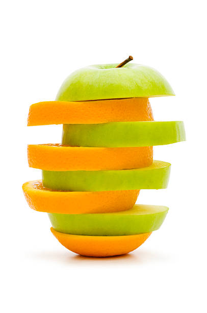istock Sliced orange and apple isolated on the white 92045980