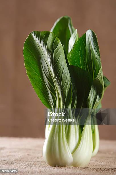 Chinese Cabbage Bok Choy Pakchoi On Rustic Brown Background Stock Photo - Download Image Now