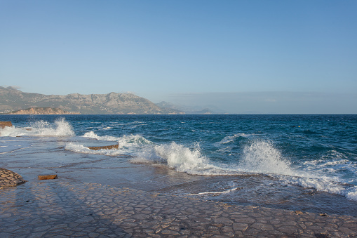 Storm waves on the Ploce beach, coast of Montenegro.
