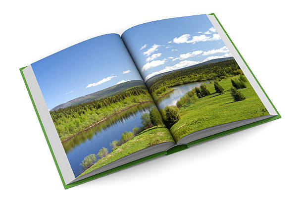 istock An open book of a landscape on a white background 92046727