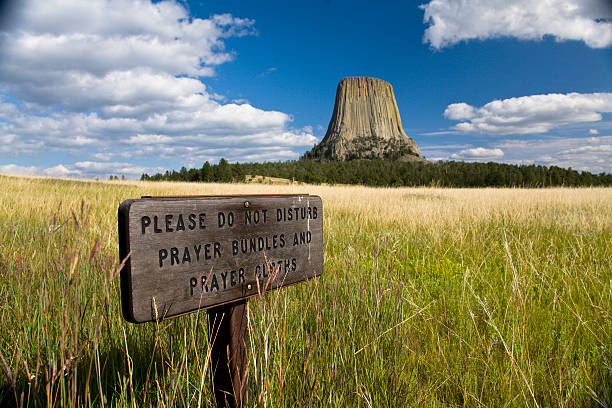 Do Not Disturb Sign in front of Devils Tower stock photo