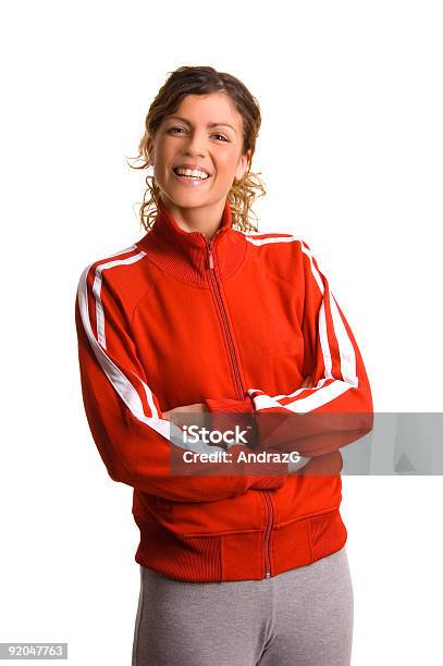 Lächelnd Lässig Mädchen Stockfoto und mehr Bilder von Trainingsanzug - Trainingsanzug, Frauen, Freisteller – Neutraler Hintergrund