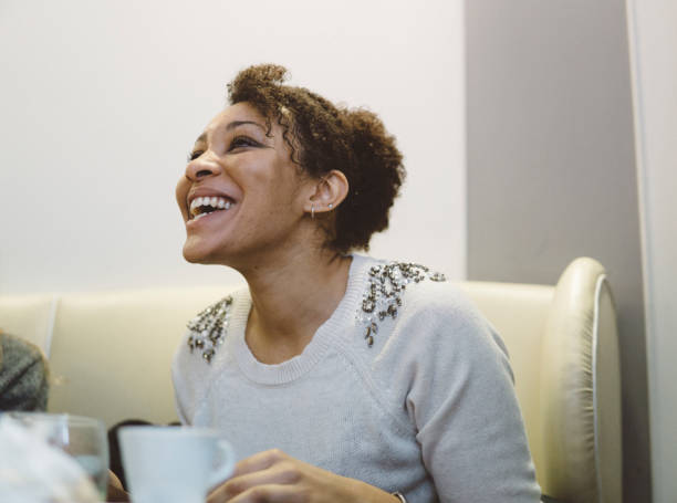 istock Smiling young woman during a coffee break 920477804