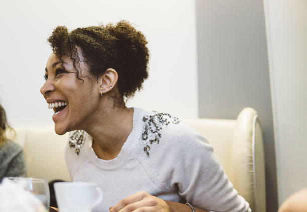 istock Smiling young woman during a coffee break 920477816