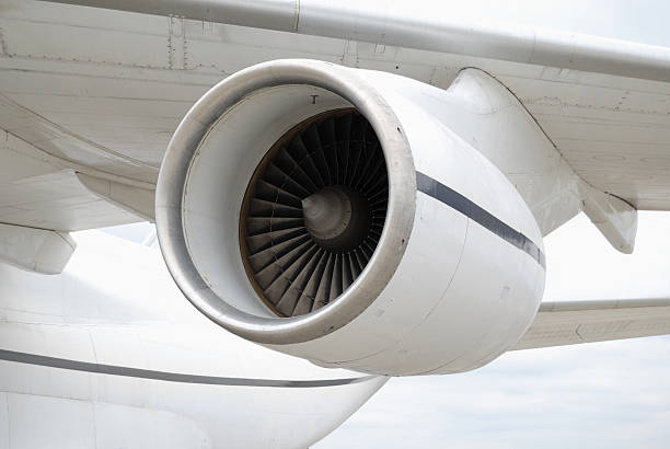 istock Turbo-jet engine under wing of airplane 92048104
