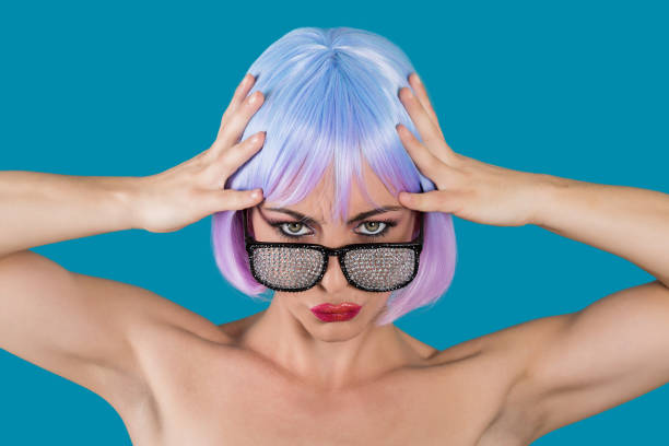 istock Woman in glamour glasses holding head 920486442