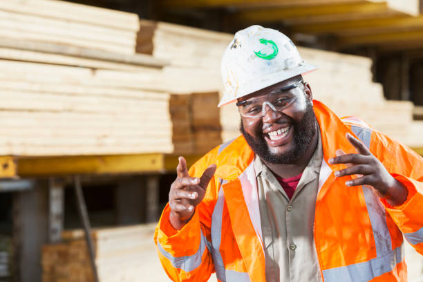 istock African-American man working in a lumberyard 920496378