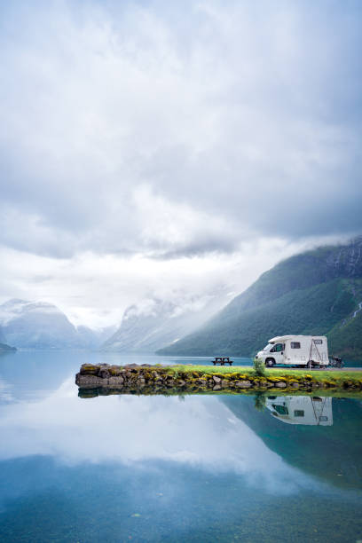 Family vacation travel RV, holiday trip in motorhome Family vacation travel RV, holiday trip in motorhome, Caravan car Vacation. Beautiful Nature Norway natural landscape. northern europe family car stock pictures, royalty-free photos & images