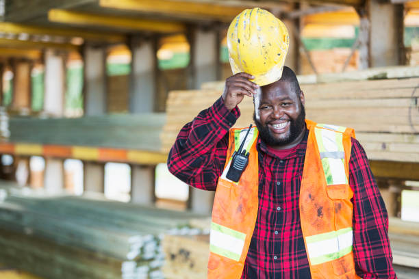 istock African-American man working in a lumberyard 920497020