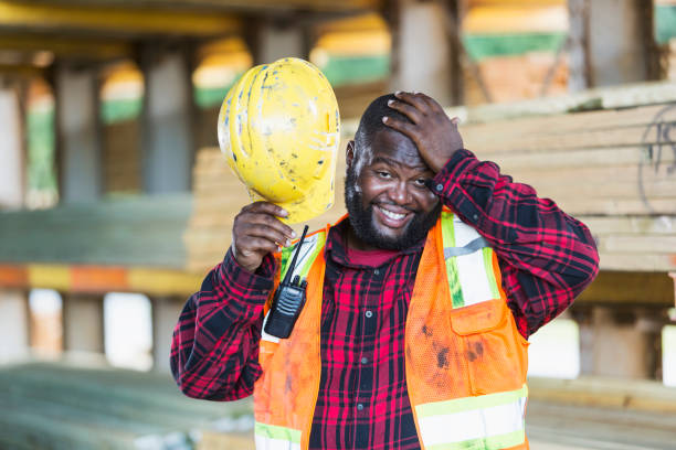 istock African-American man working in a lumberyard 920497102