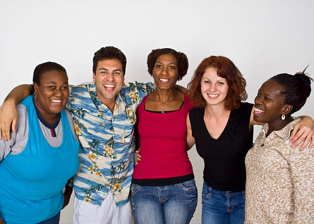 istock Diverse group of friends embracing each other 92049797