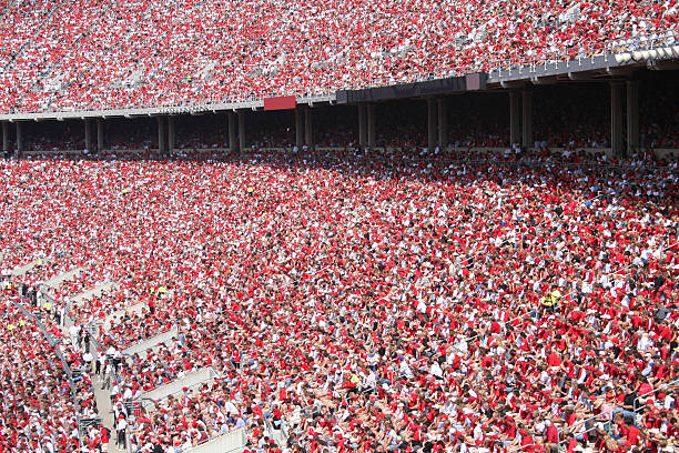 красное море - sport crowd fan stadium стоковые фото и изображения
