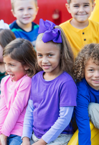 istock Multi-ethnic school children on playground 920503120