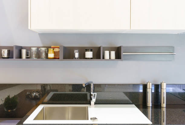 istock Modern, bright, clean kitchen interior with stainless steel appliances in a luxury apartment. 920503696
