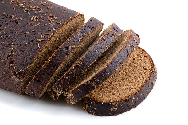 dark brown bread over white background - 粗黑麥麵包 個照片及圖片檔