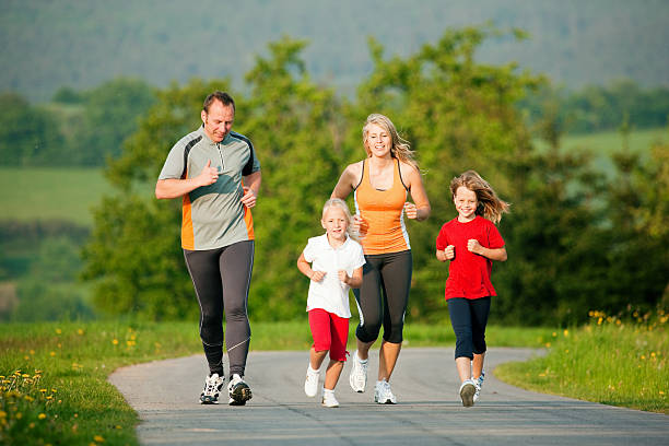istock Family jogging outdoors 92051244